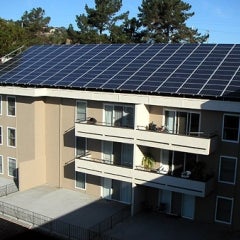 32 kW Roof Mount solar array on flat roof with tilt