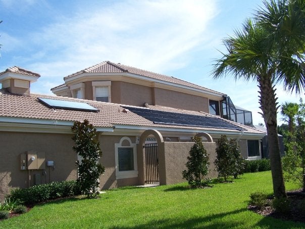 A tile roof application of solar pool heating and solar water he