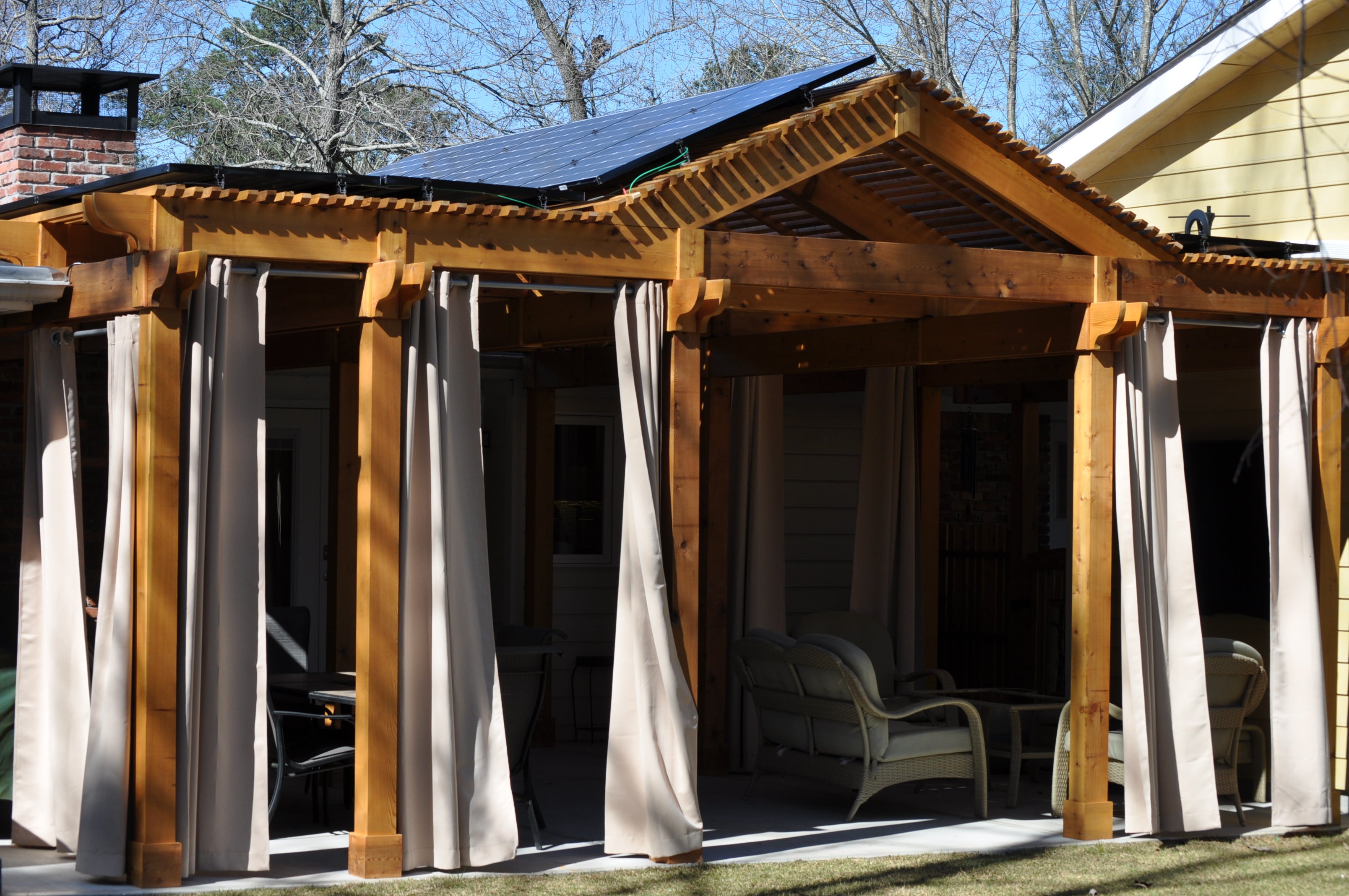 Custom pergola structure with sleek solar for shade and low energy bills! Built in Dunwoody, GA