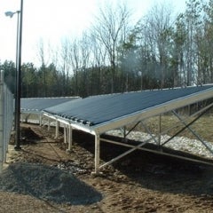 1800 sq ft solar seasonal pool heating system. 