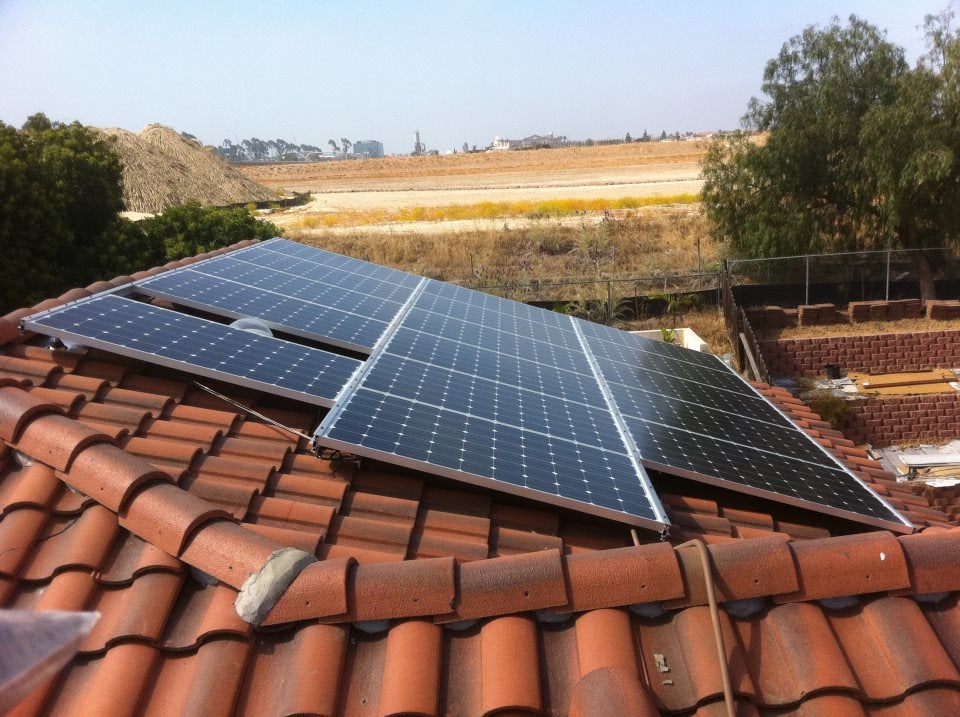 Solar electric PV system on tile roof