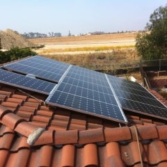 Solar electric PV system on tile roof