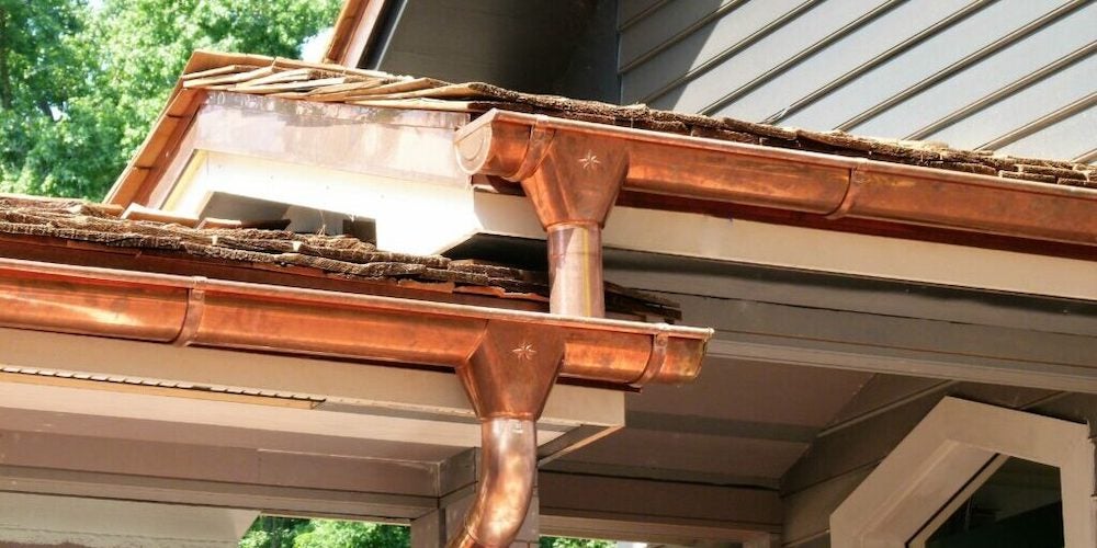 Rain Chains vs Downspouts What are They & How Do They Work?