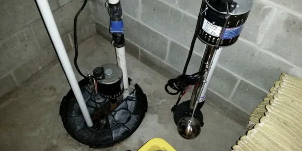 Pedestal sump pump installed in a basement