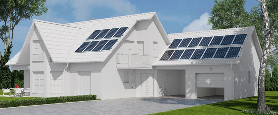 Image of a beige home’s roof with solar panels installed.