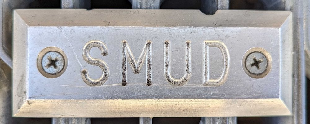 SMUD logo on a metal plate
