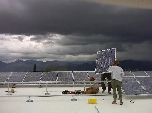 Beyond Electricity: Photovoltaics Harvest Sun and Rain