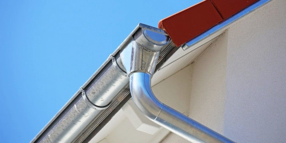 Steel gutters on a residential roof
