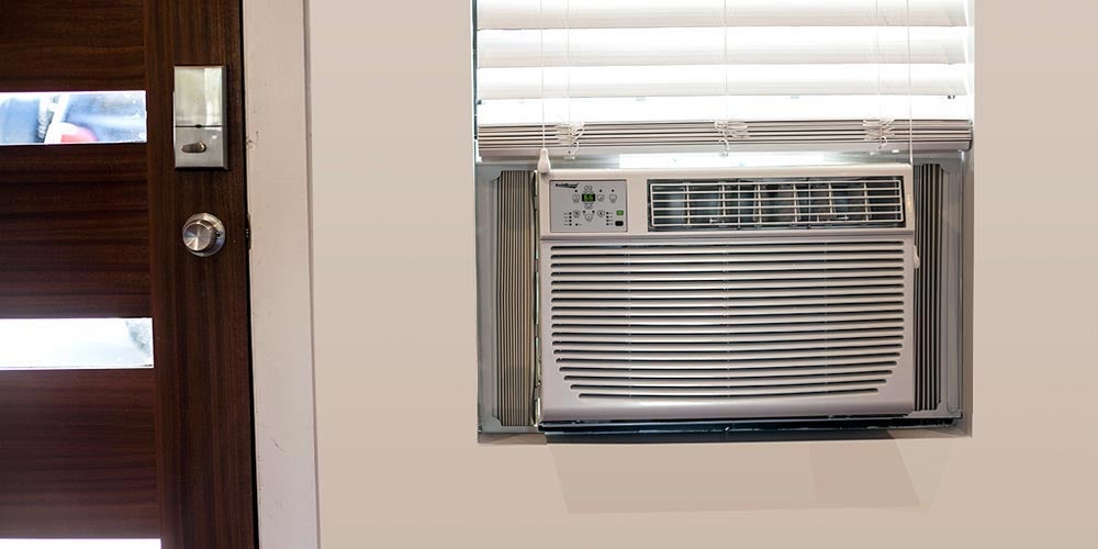 Window air conditioner installed in a home
