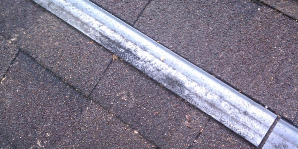 Zinc strips fixed to a metal roof